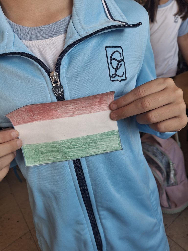 Alumno Zola con una bandera de Méjico